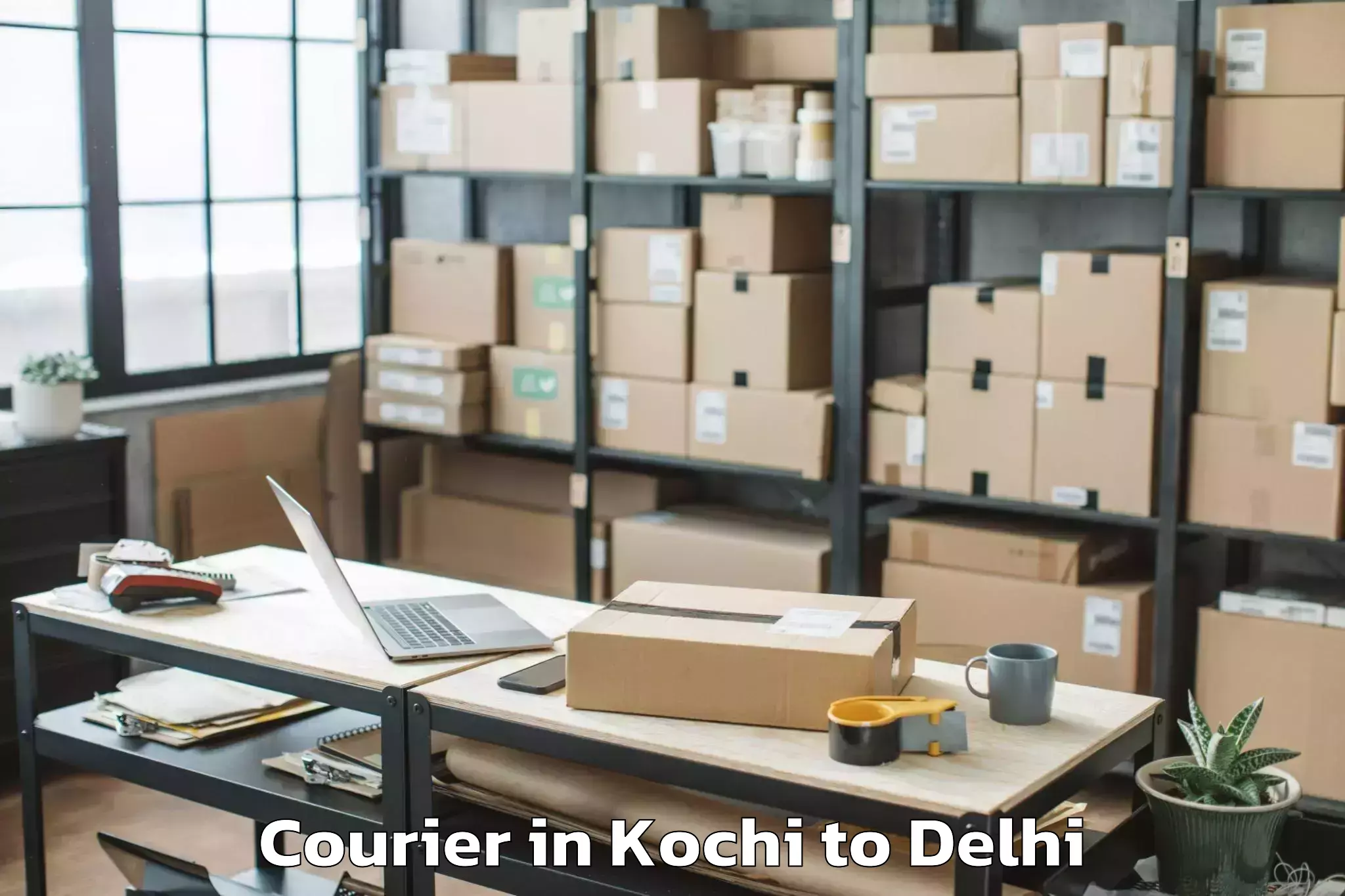 Book Kochi to V3s East Centre Mall Courier Online